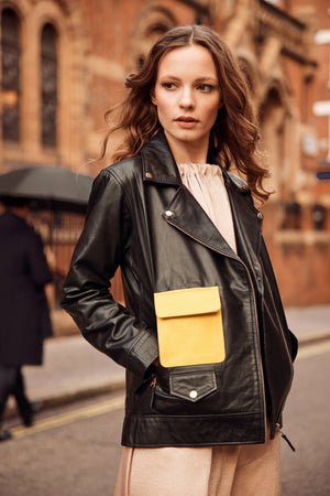 Black leather jacket with yellow pocket